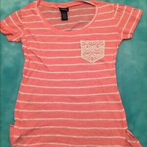 Forever 21 size small short sleeve shirt with one lace pocket.